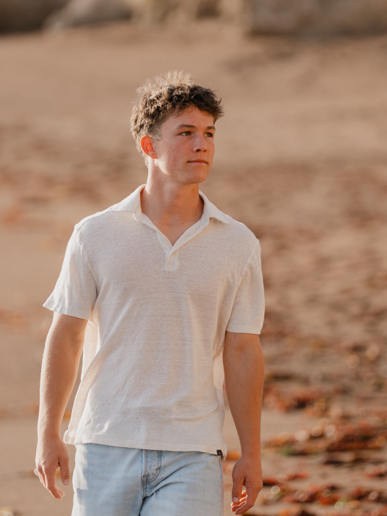 Senior walking along the beach at sunset — Central Coast senior photographer